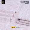 The yarn of Kamalia Handmade Khaddi Khaddar is prepared through the traditional Charkha-spinning process, every thread carries the natural irregularities and individuality that make handmade fabric different from mass-produced machine-made cloth.